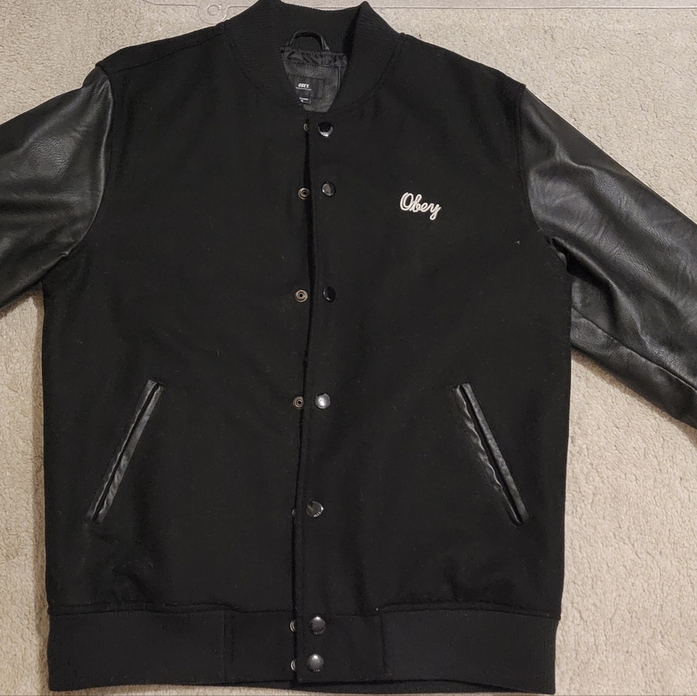 Obey varsity jacket . Size Medium. Black.